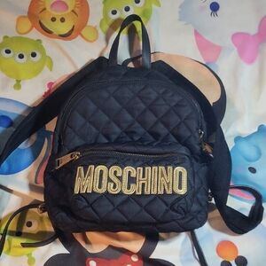 Moschino Black Quilted Backpack with Gold Logo-All sales are final. No Refunds